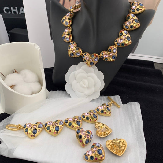 Gold jewelry set with heart-shaped designs