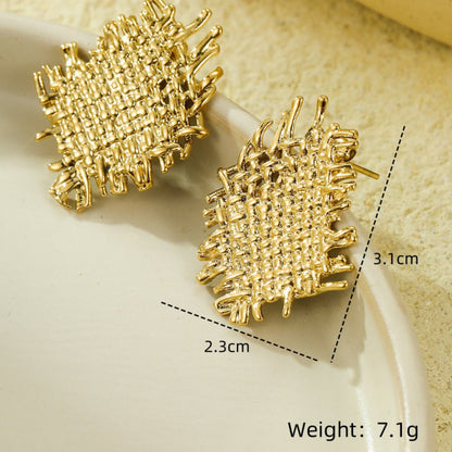 Gold textured earrings on a beige background with measurements and weight displayed.