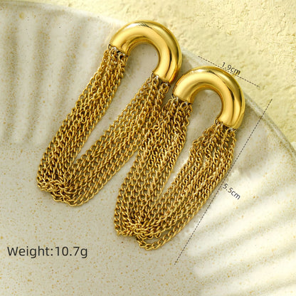 Gold chain earrings on a textured surface with measurements and weight displayed.