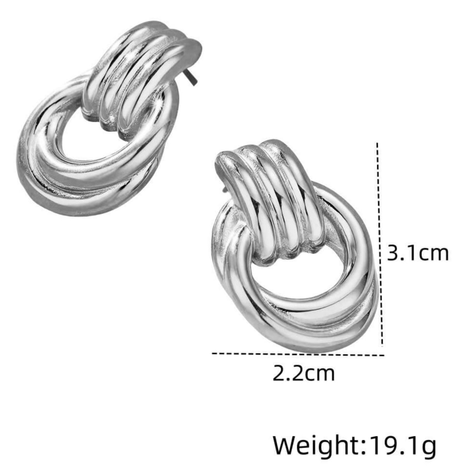 Silver knot earrings with measurements on a white background